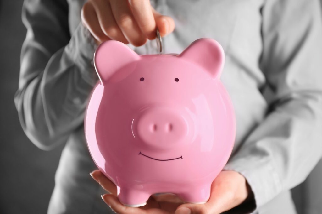 Ein rosa Sparschwein symbolisiert die Einnahmen die ich bei richtiger Kalkulation meines Preises als Trageberaterin mache